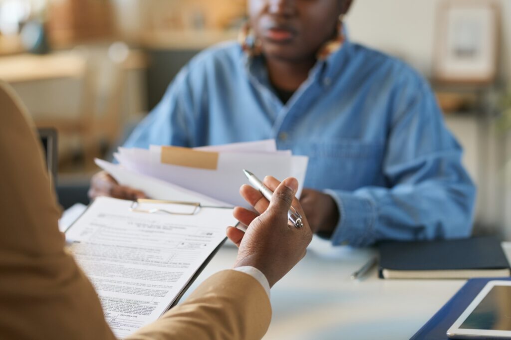 Closeup of Black Man Discussing Taxes